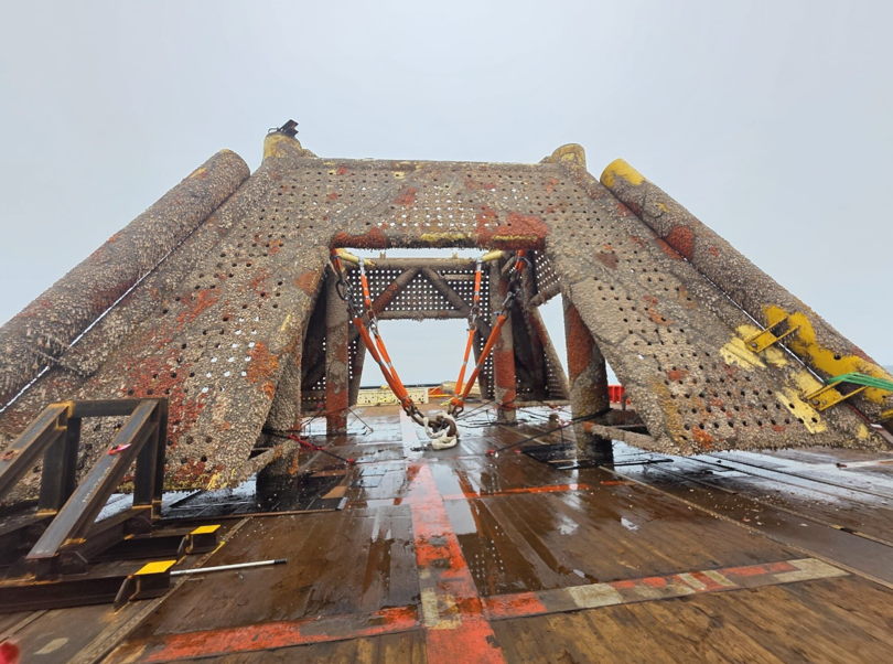 Wellhead protection structure after piles had been internally severed and retro fit legs removed